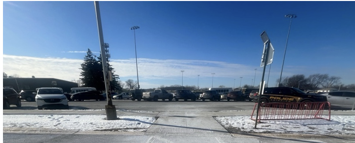 Griffith High School students parking in the student parking lot on Wiggs Street.